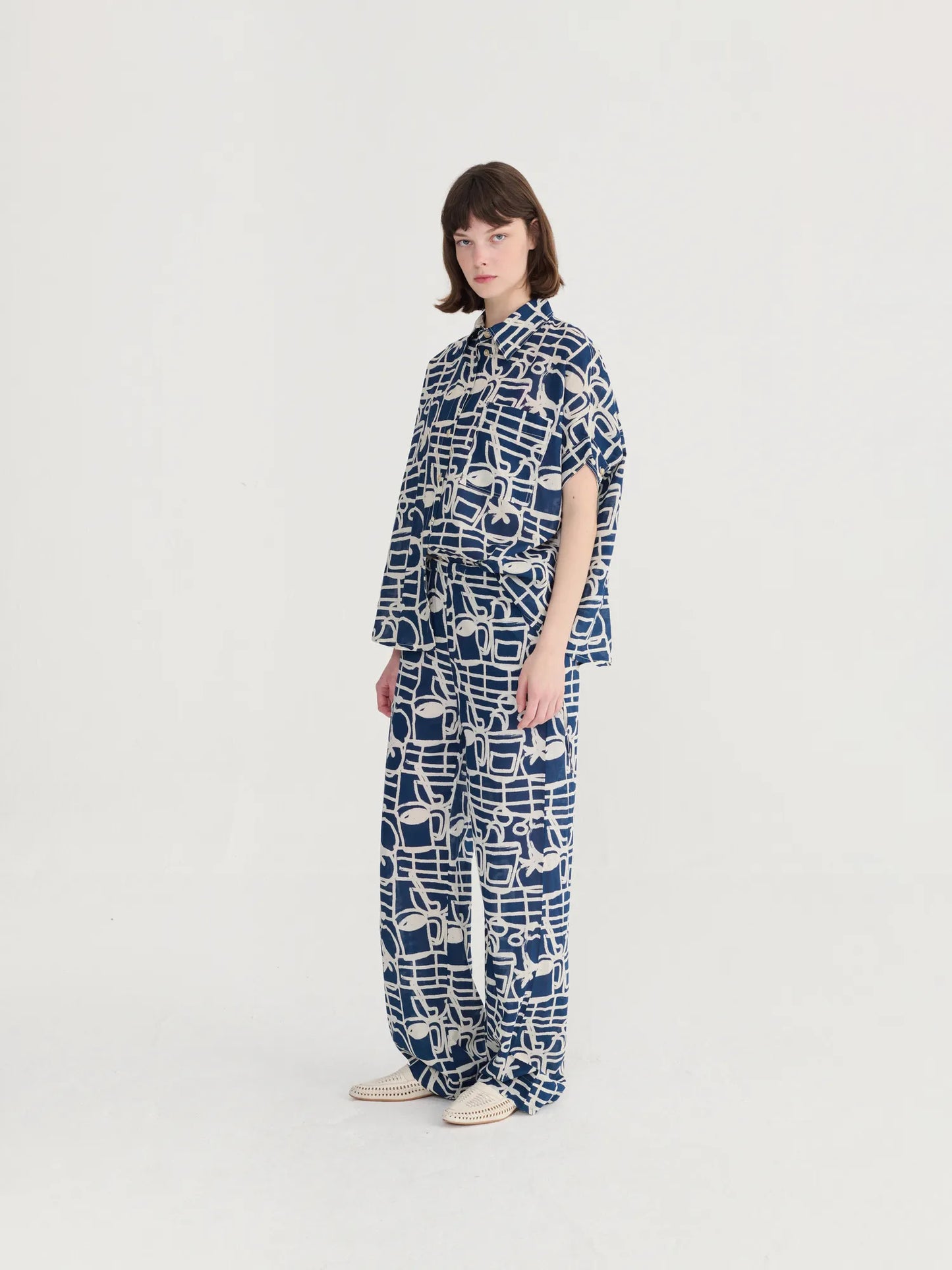 Cookery festival pattern wide-leg trousers