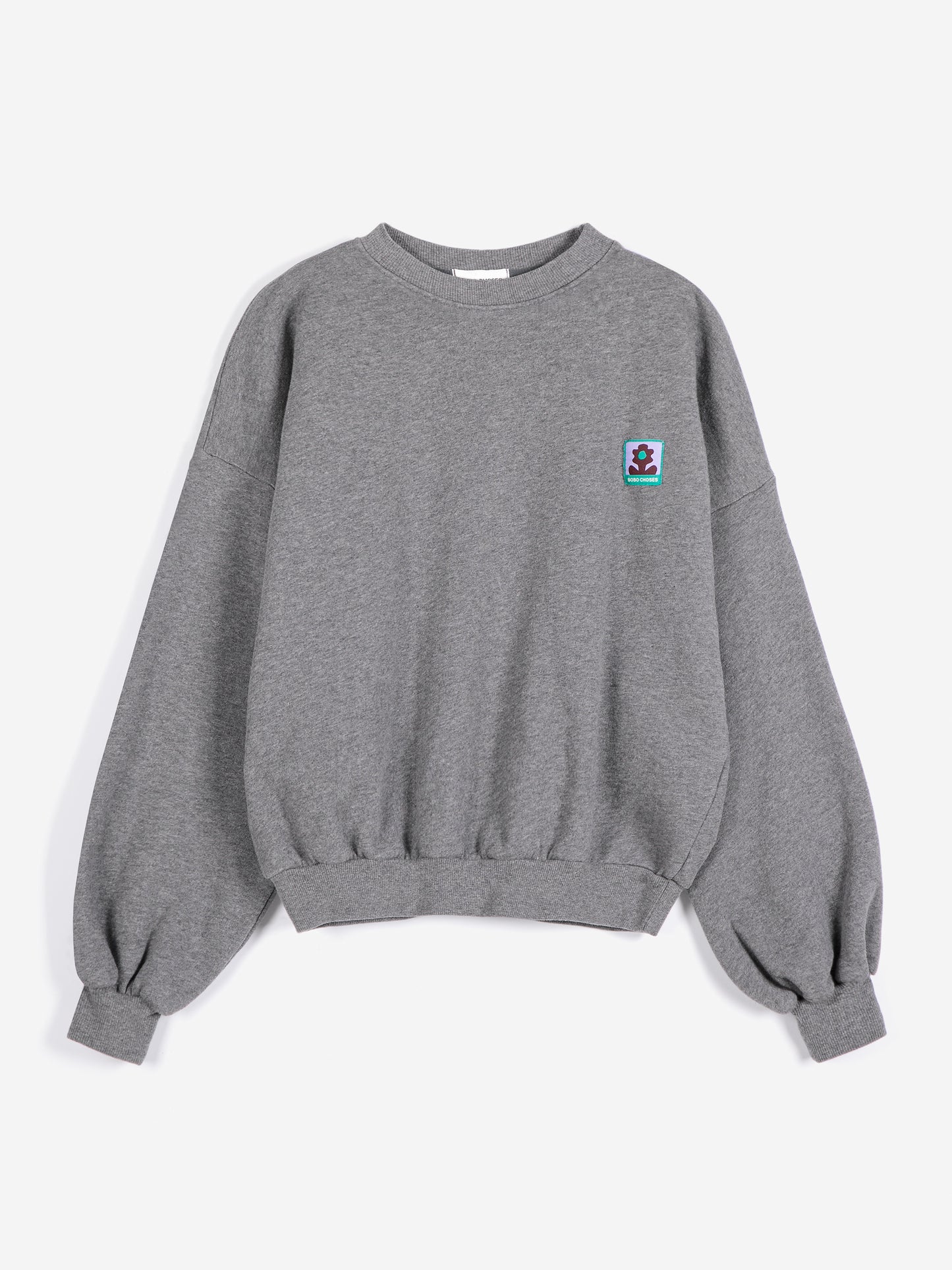 Sudadera de corte holgado lila con etiqueta
