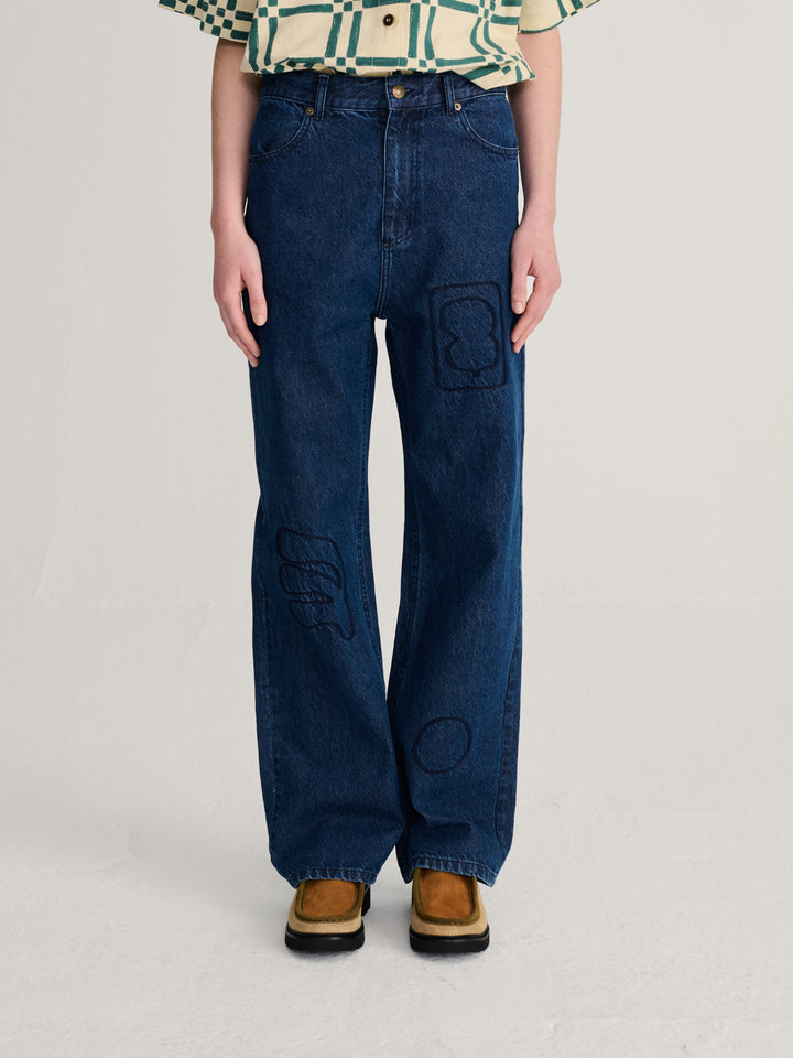 Embroidery washed mid-waist jeans