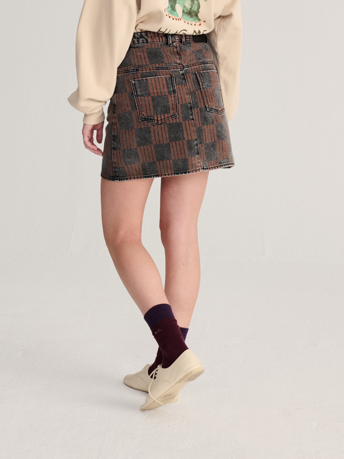 Almost Moiré all over washed denim mini skirt